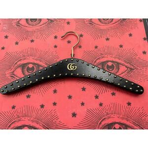Gucci Black Satin And Brass Hanger With Brass GG Symbol.